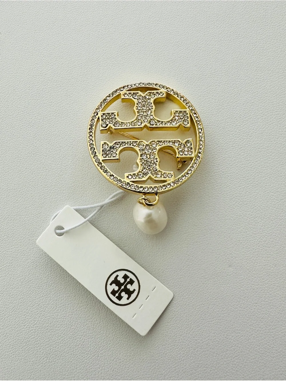 Tory Burch gold tone